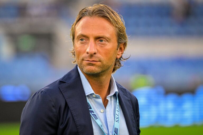 Ritratto di Flavio Ricciardella con capelli castani e giacca scura, al centro del discorso sulla salvezza del Genoa dopo Roma